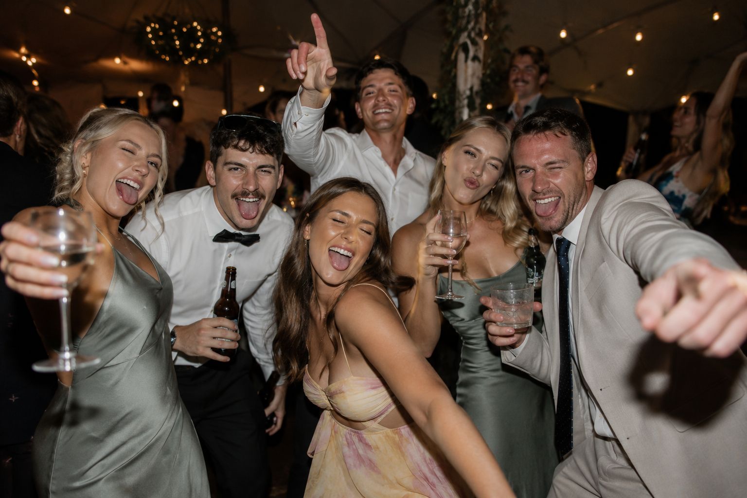 Friends celebrating together on the dance floor